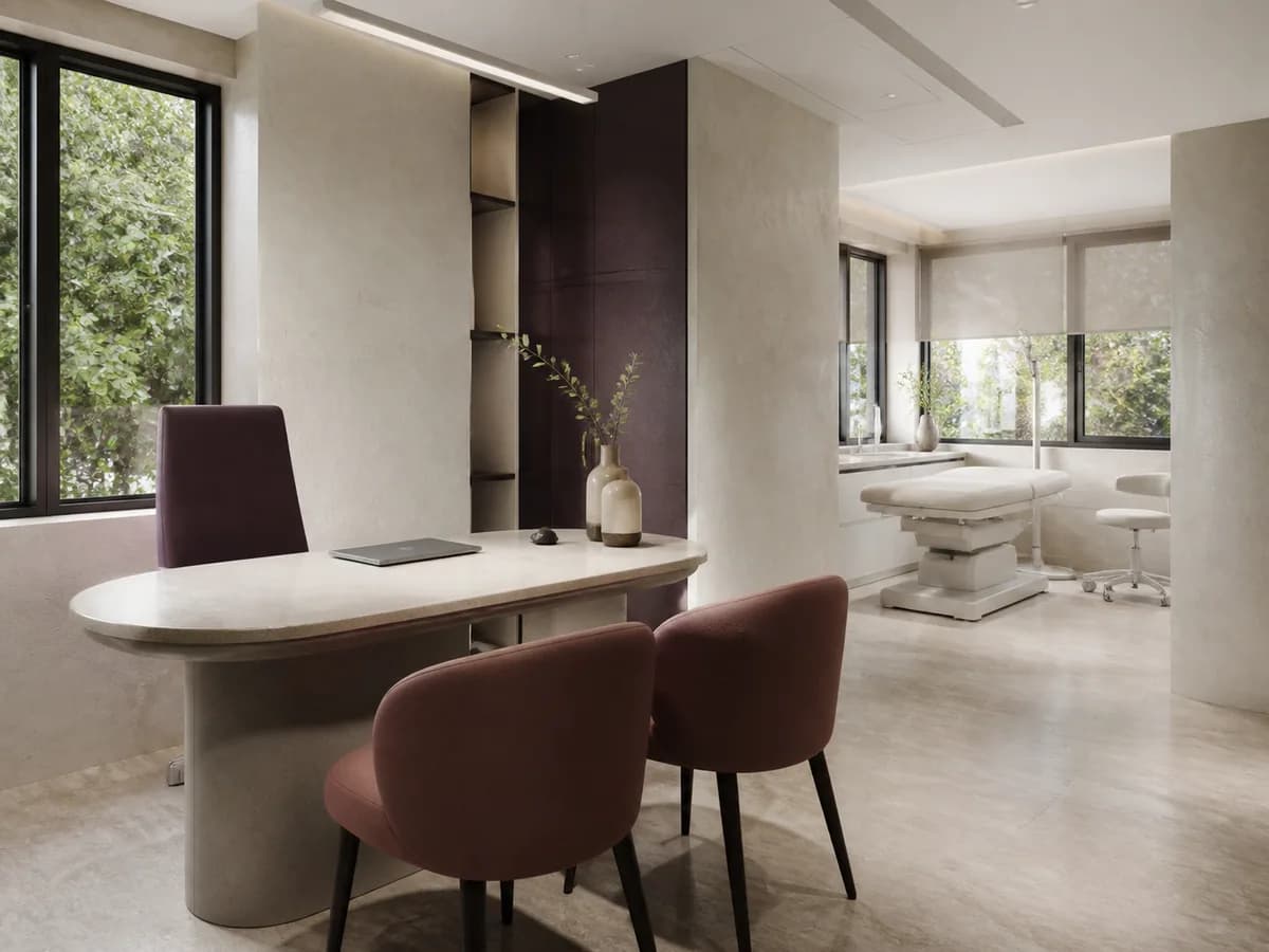 Warm ivory consultation room with natural materials